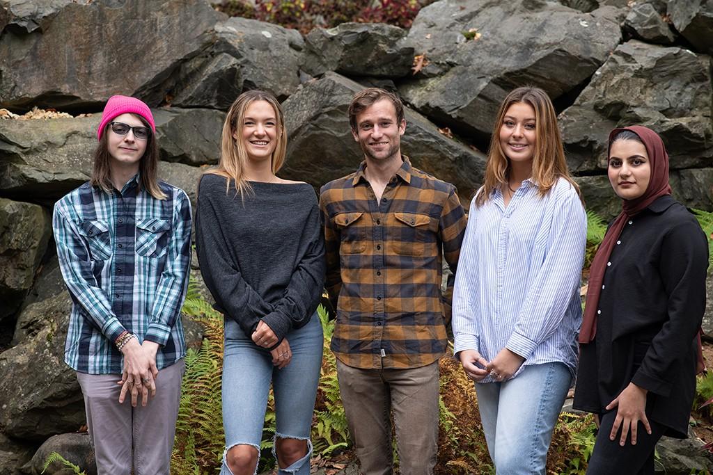 The five Shaw Senior Fellows standing in a line